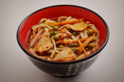 Japanese hot chicken soup with rice noodles and vegetables